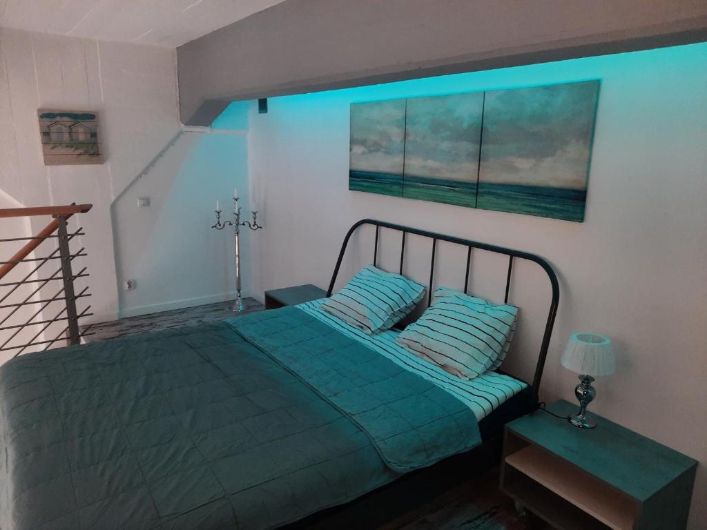 Postel nebo postele na pokoji v ubytování Apartament wakacyjny Podczele