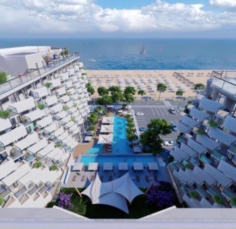 an aerial view of a hotel on the beach at Alee Infinity Pool & Spa by Black Sea in Mamaia Nord