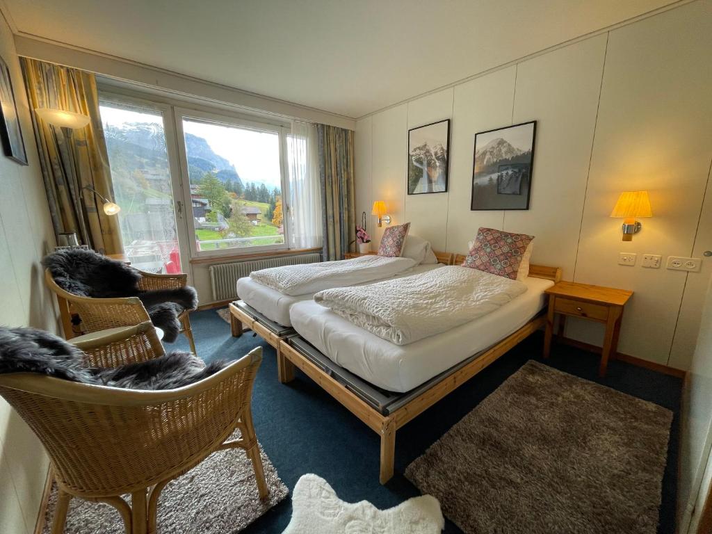 Postel nebo postele na pokoji v ubytování Guest Rooms with a great view at Residence Brunner