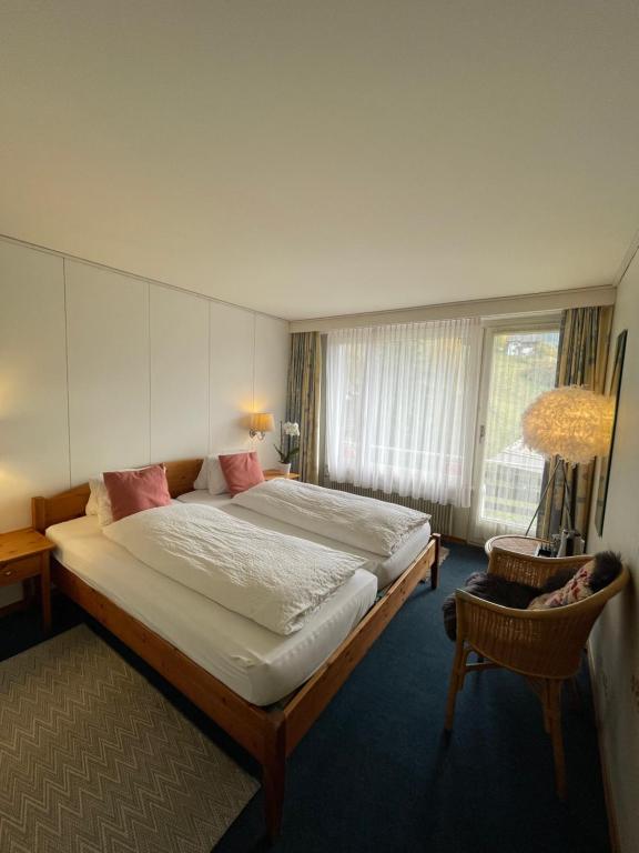 Postel nebo postele na pokoji v ubytování Guest Rooms with a great view at Residence Brunner