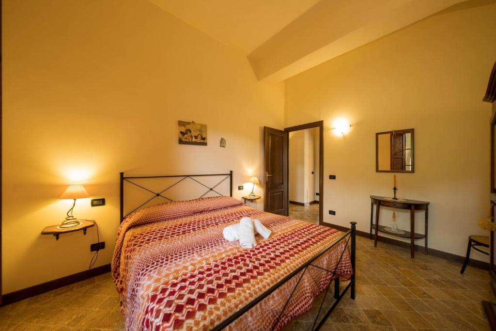 Postel nebo postele na pokoji v ubytování Agriturismo Due Ponti