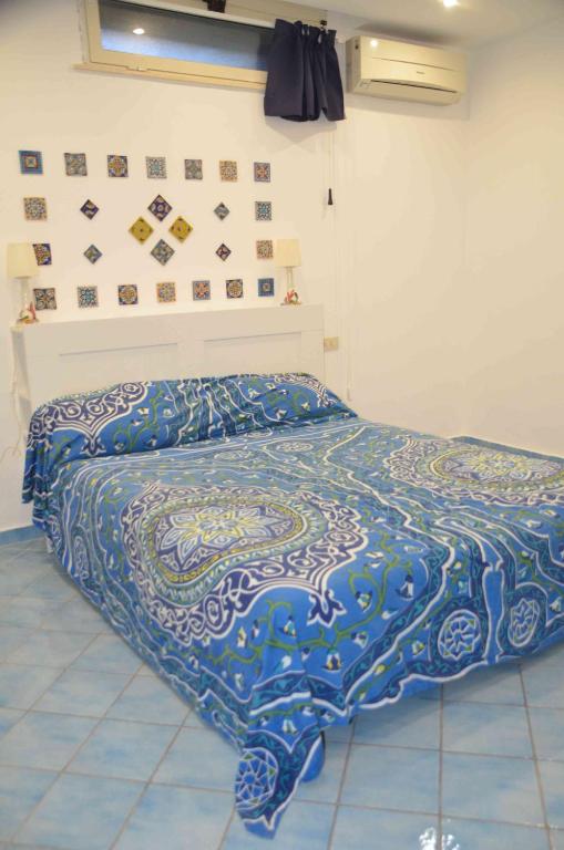 Postel nebo postele na pokoji v ubytování La Draghina B&B Capri