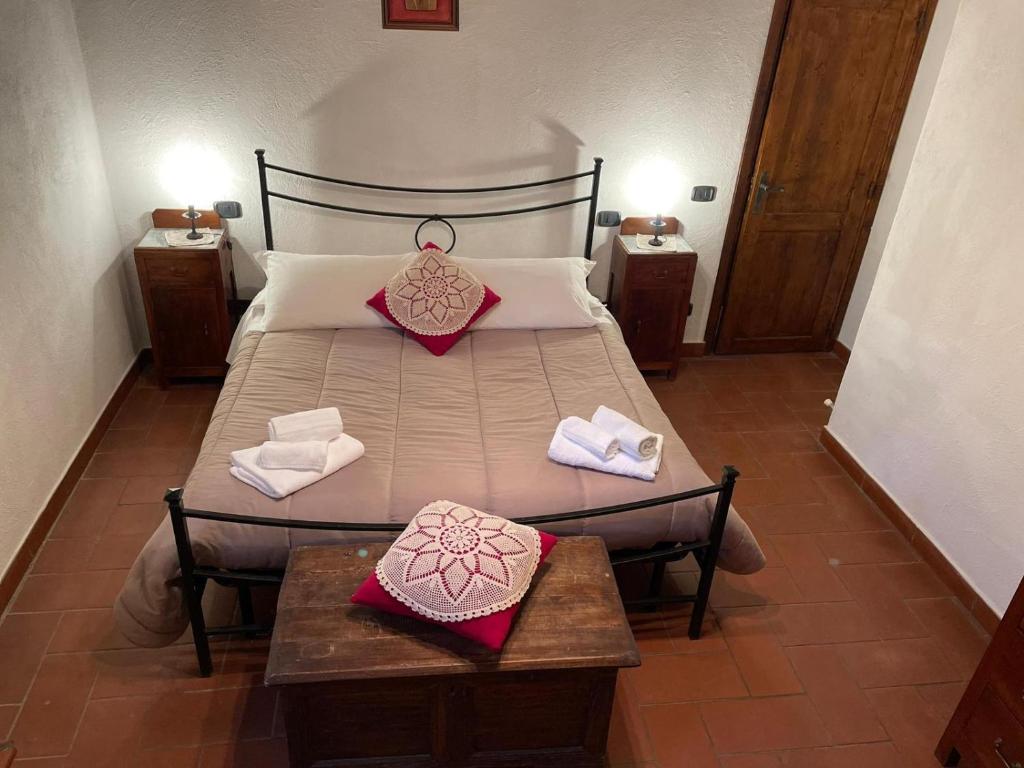 Postel nebo postele na pokoji v ubytování AgriHouse Orvieto