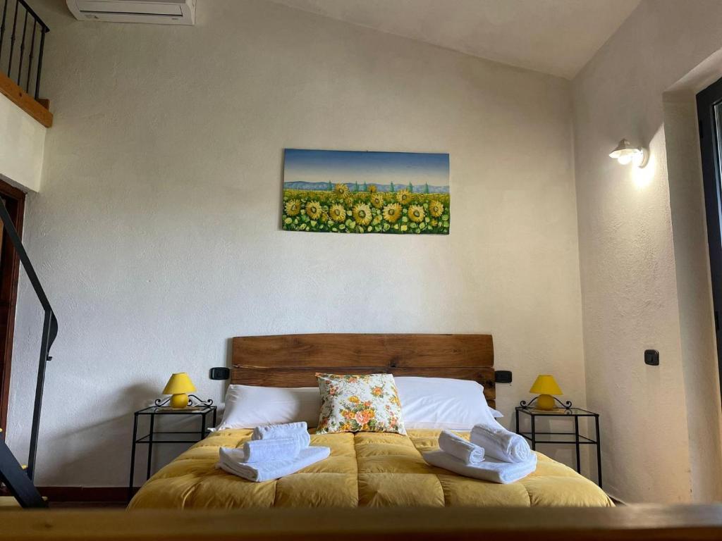 Postel nebo postele na pokoji v ubytování AgriHouse Orvieto
