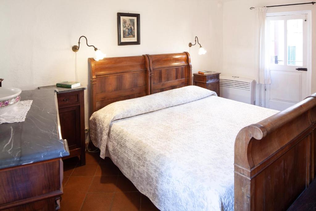 A bed or beds in a room at Chiara House