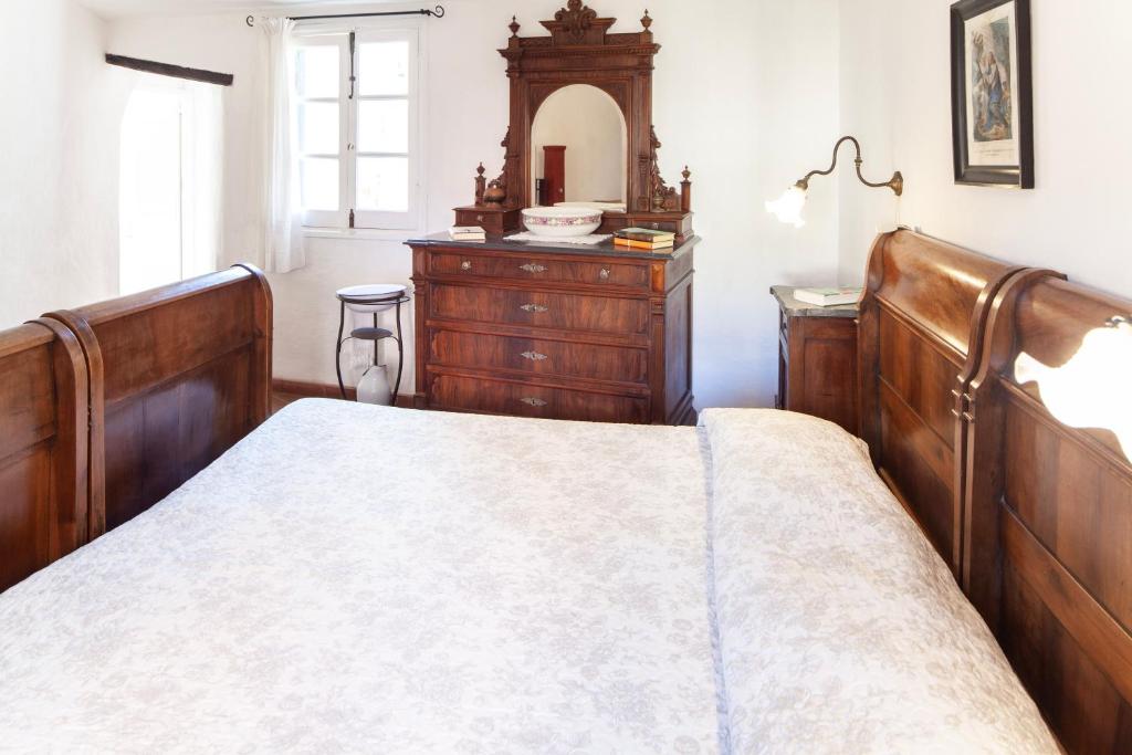A bed or beds in a room at Chiara House