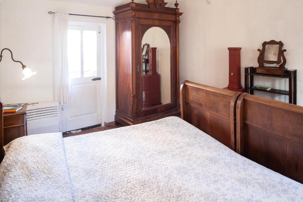A bed or beds in a room at Chiara House