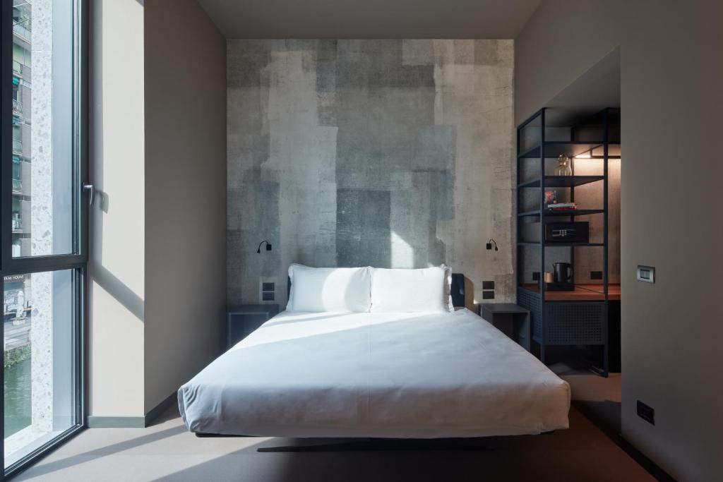 Letto o letti in una camera di 21 House of Stories Navigli