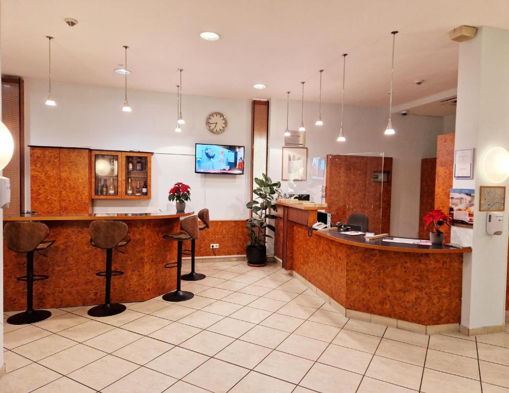 TV a/nebo společenská místnost v ubytování Trip Inn Hotel Minerva Frankfurt