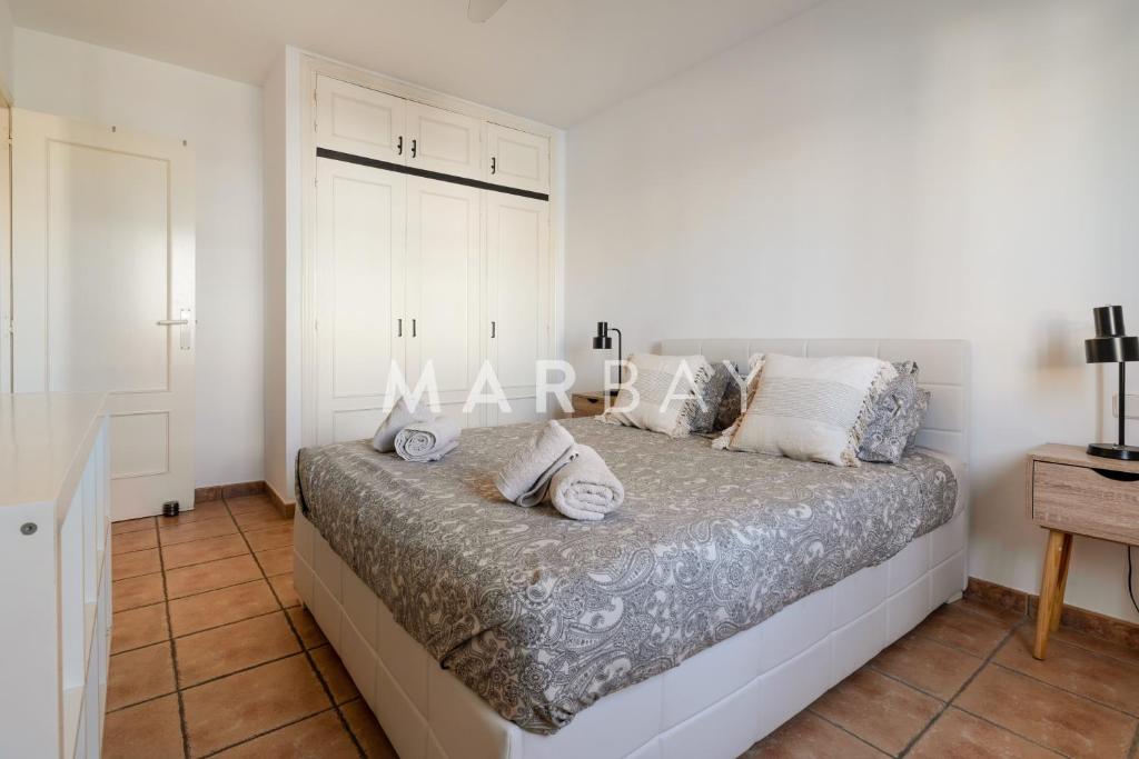 Postel nebo postele na pokoji v ubytování Apartamento Geneve