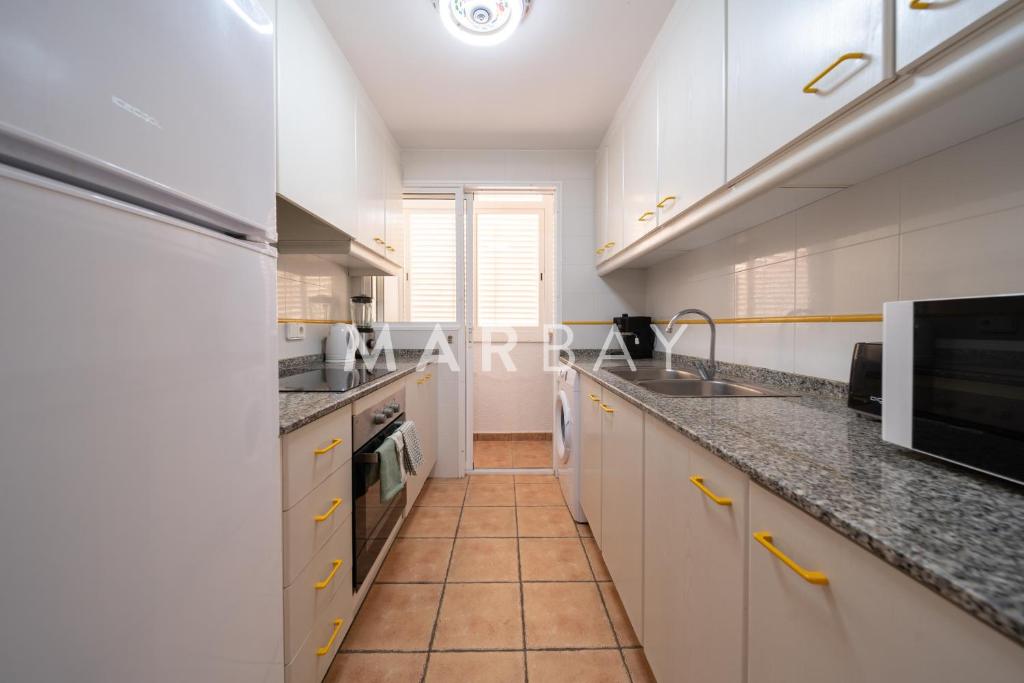 Kuchyň nebo kuchyňský kout v ubytování Apartamento Geneve