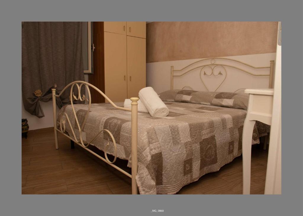 Postel nebo postele na pokoji v ubytování B&B Pastello