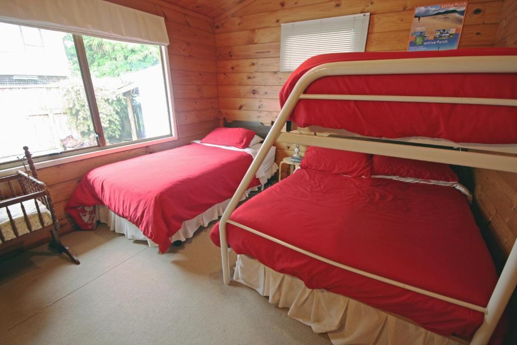 Postel nebo postele na pokoji v ubytování Tony's Lodge