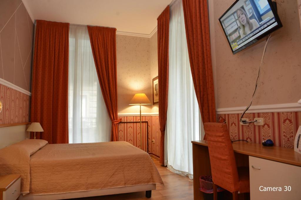 Posteľ alebo postele v izbe v ubytovaní Catania Centro Rooms