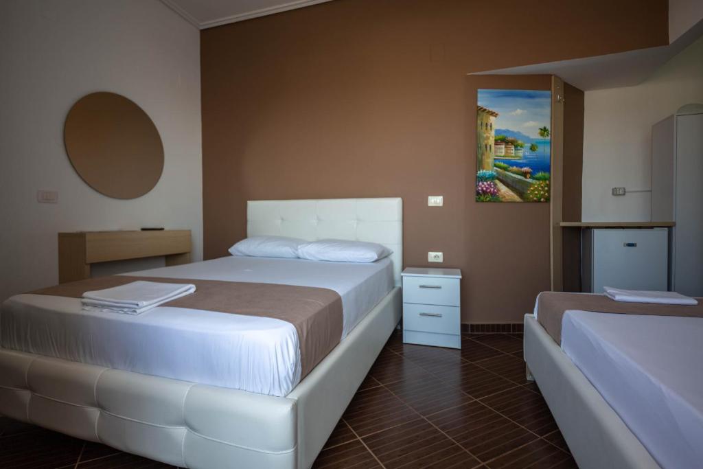 Postel nebo postele na pokoji v ubytování Vale Deti Rooms