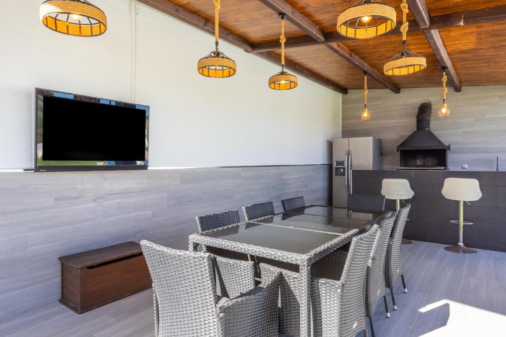 TV a/nebo společenská místnost v ubytování Casa rural Paradise Holidays