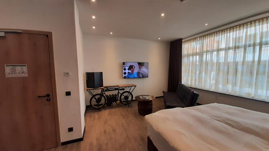 TV a/nebo společenská místnost v ubytování Hotel Krupp