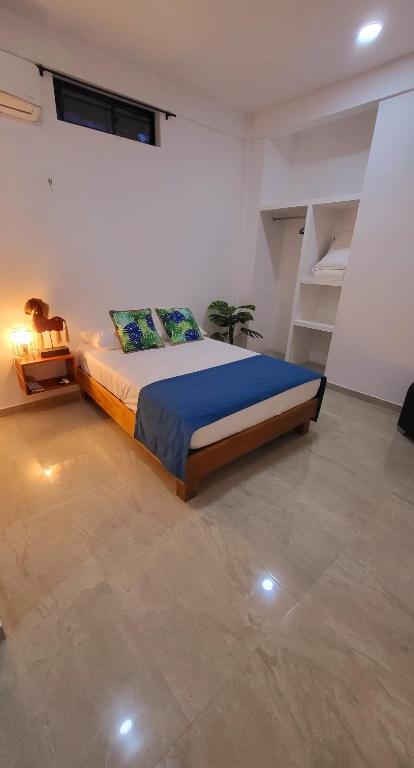 Postel nebo postele na pokoji v ubytování Amazonia Deluxe Calle 13