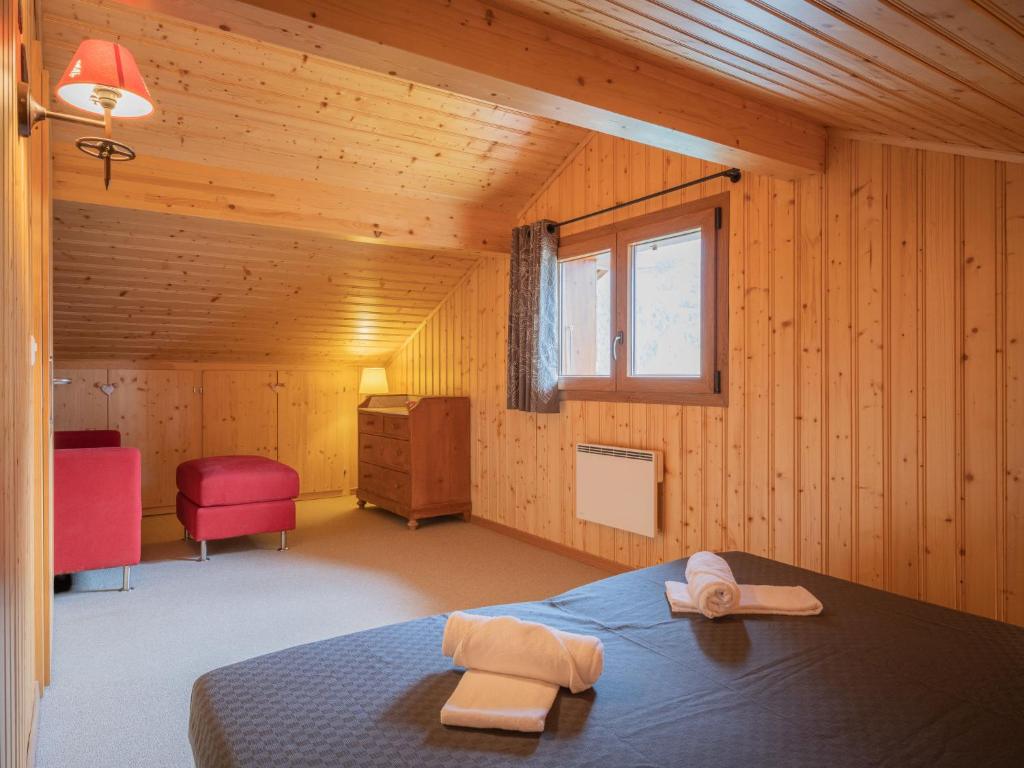 Postel nebo postele na pokoji v ubytování Chalet Coprin by Interhome