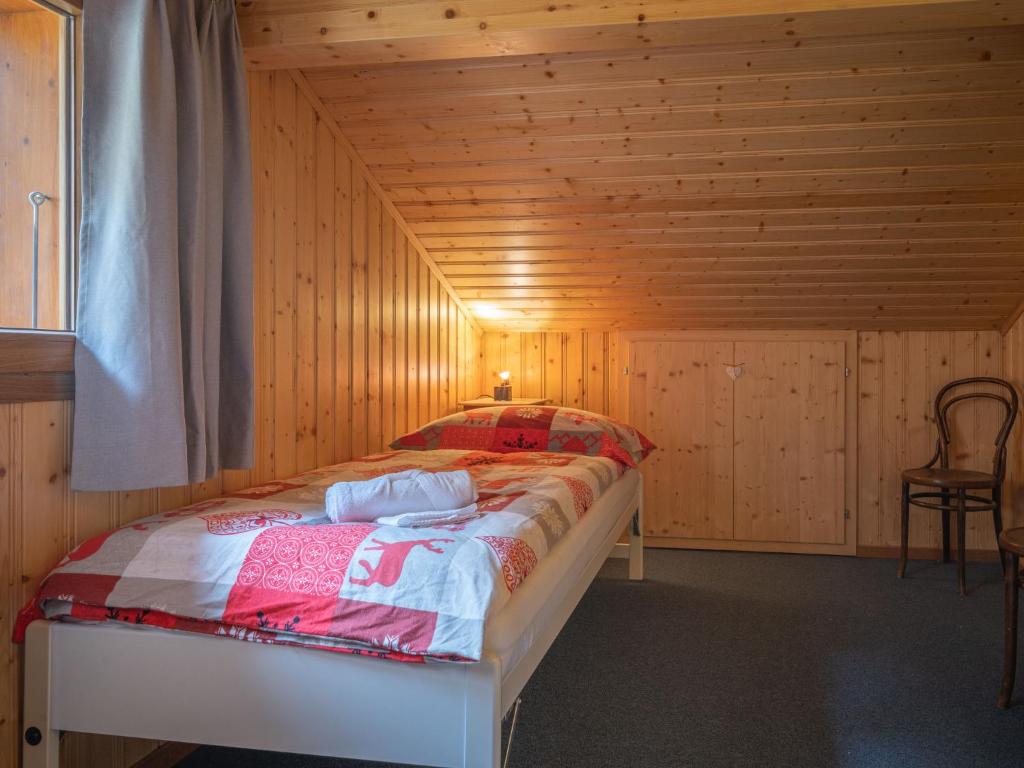 Postel nebo postele na pokoji v ubytování Chalet Coprin by Interhome