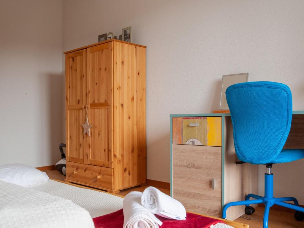 Postel nebo postele na pokoji v ubytování Apartment Ferme de Sandra E0 by Interhome