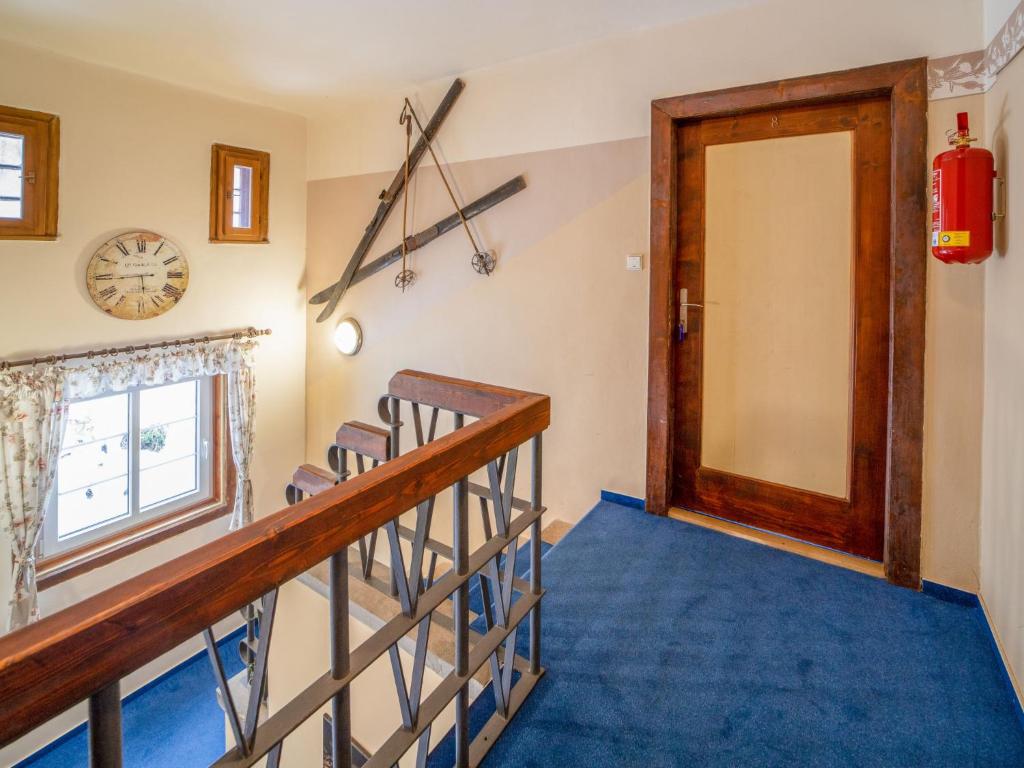 Postel nebo postele na pokoji v ubytování Chalet Krakonoš by Interhome