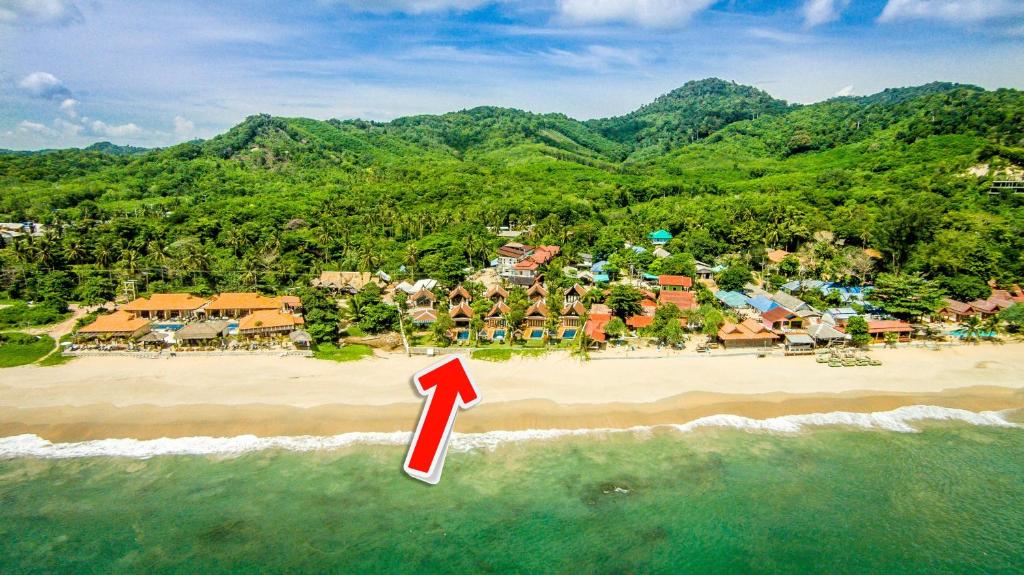 an aerial view of a beach with a red arrow at Amazing Beachfront Villa in Ko Lanta