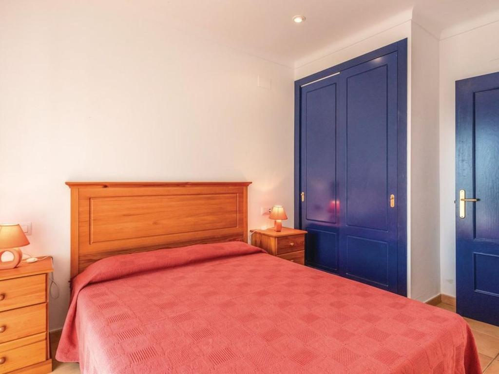Postel nebo postele na pokoji v ubytování Holiday Home Garbinell I by Interhome