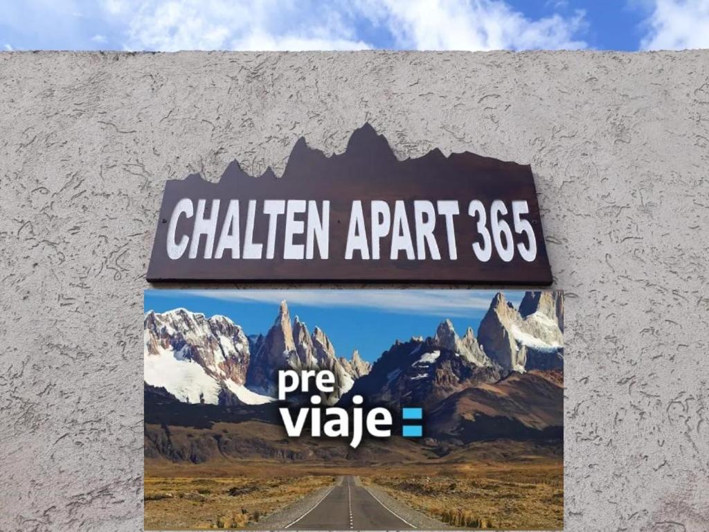 a sign on the side of a mountain at Chaltén Apart 365 in El Chalten