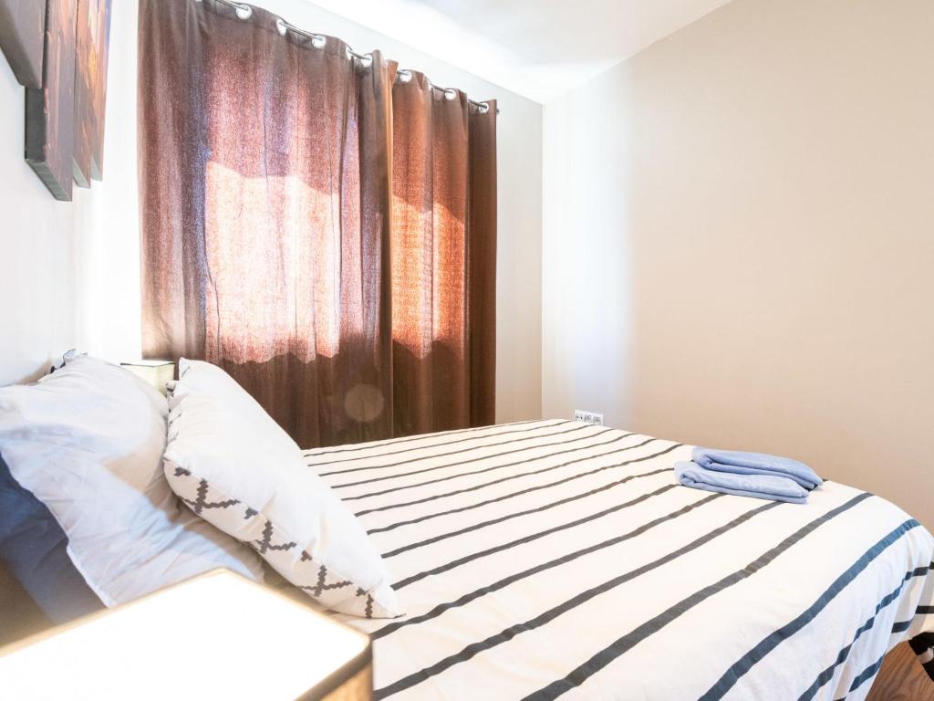 Posteľ alebo postele v izbe v ubytovaní Apartment Edificio Claudia by Interhome