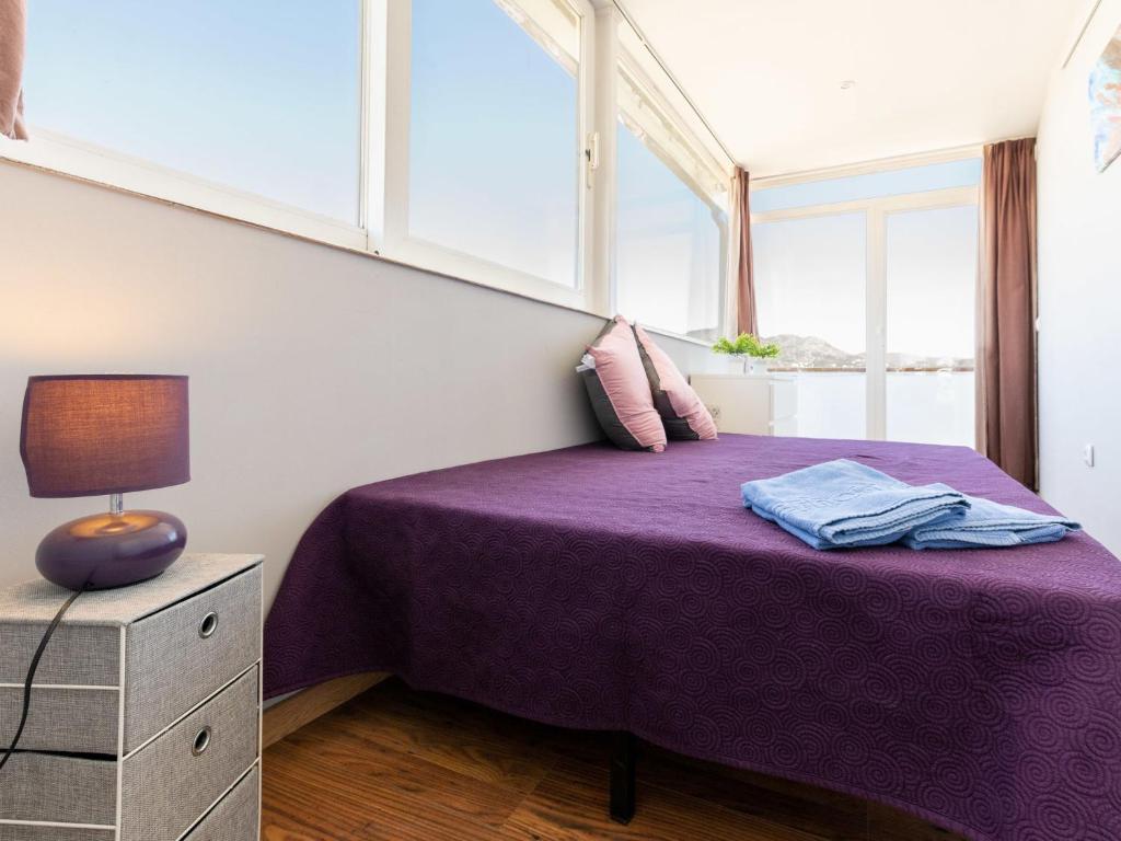 Posteľ alebo postele v izbe v ubytovaní Apartment Edificio Claudia by Interhome