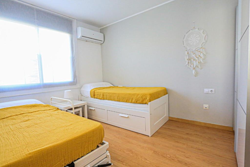Postel nebo postele na pokoji v ubytování LITORAL COSTA DORADA - LAS TERRAZAS Only families