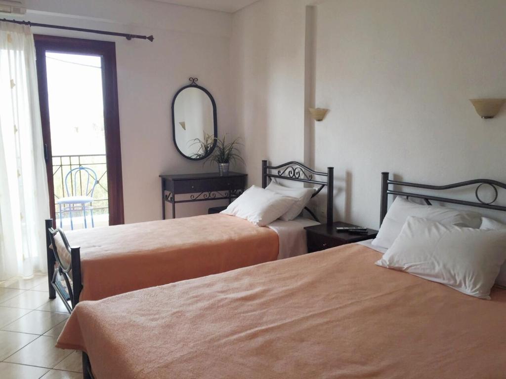 Letto o letti in una camera di Holiday Zigos