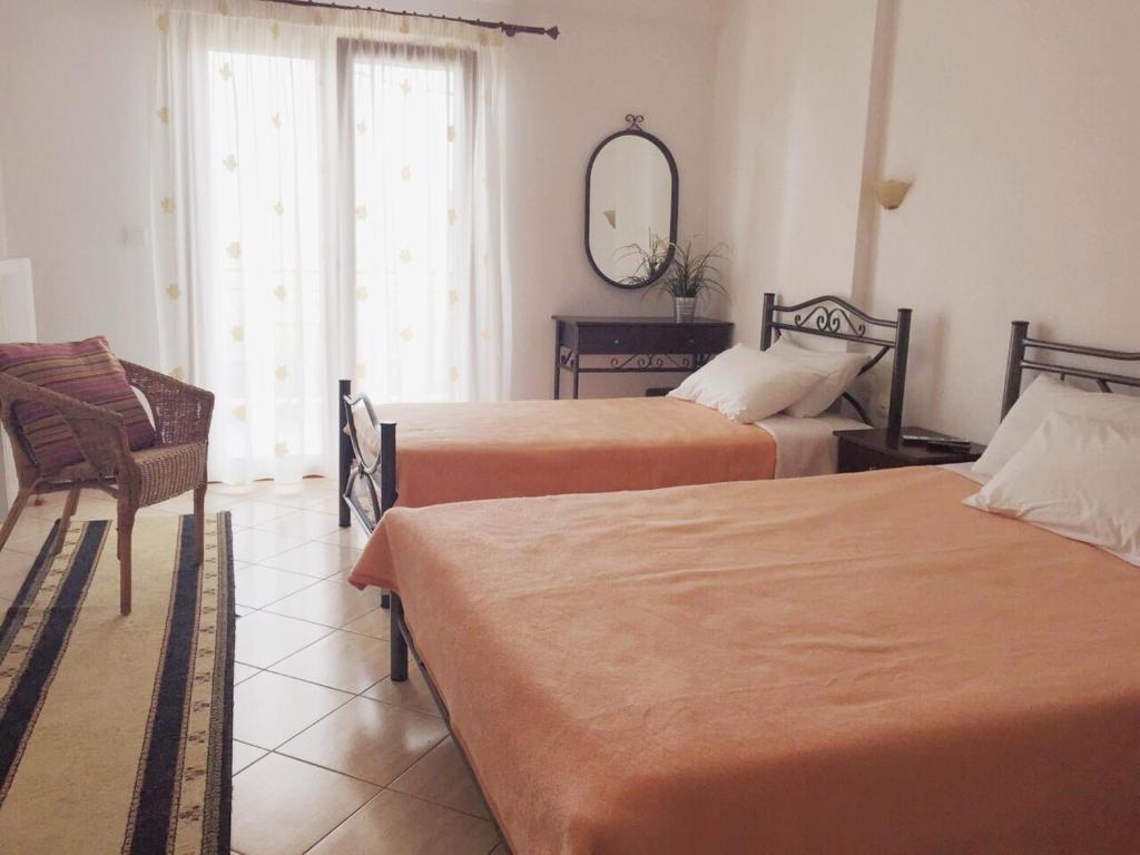 Letto o letti in una camera di Holiday Zigos