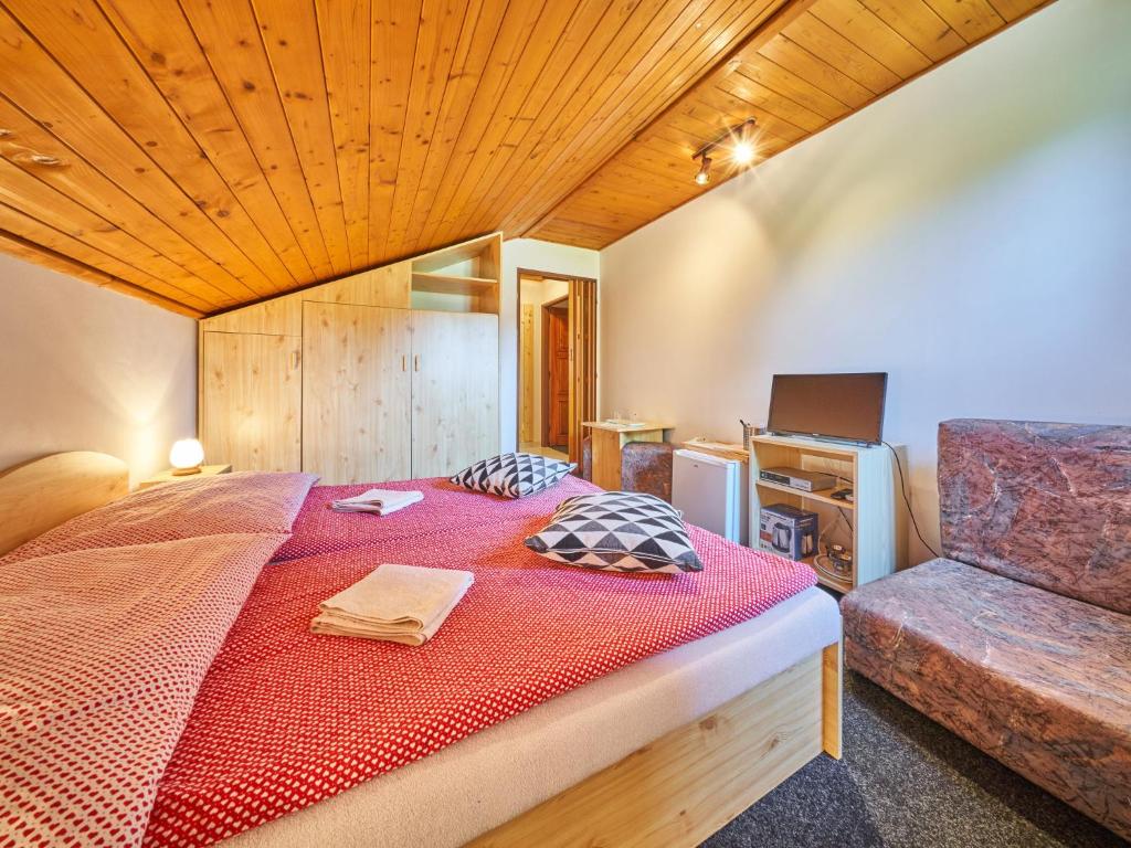 Postel nebo postele na pokoji v ubytování Holiday Home Hodkovice by Interhome