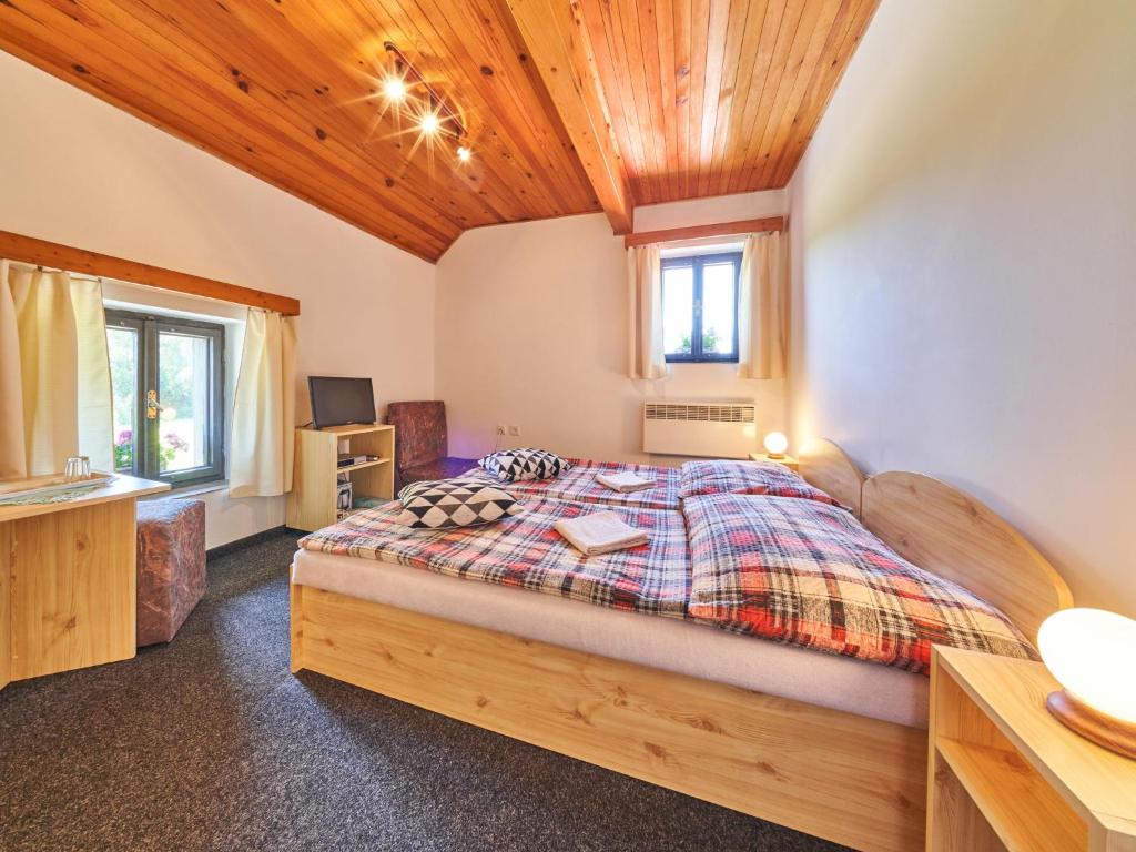Postel nebo postele na pokoji v ubytování Holiday Home Hodkovice by Interhome