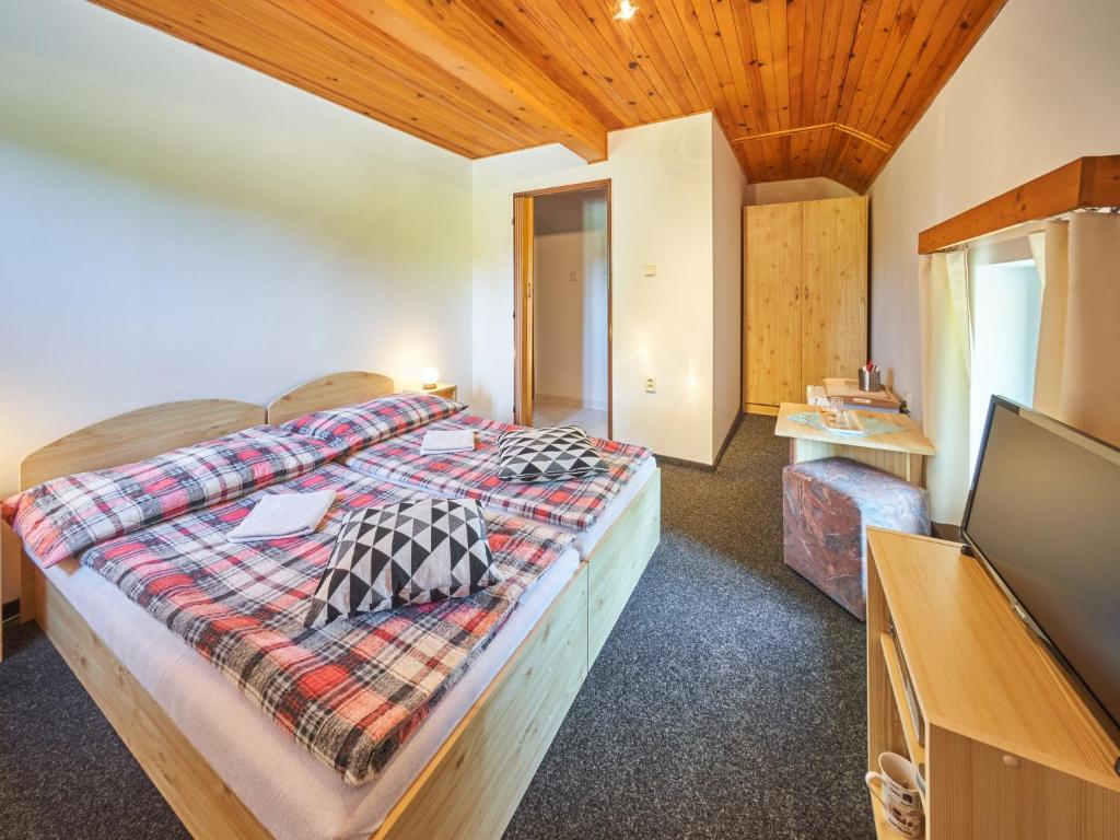 Postel nebo postele na pokoji v ubytování Holiday Home Hodkovice by Interhome