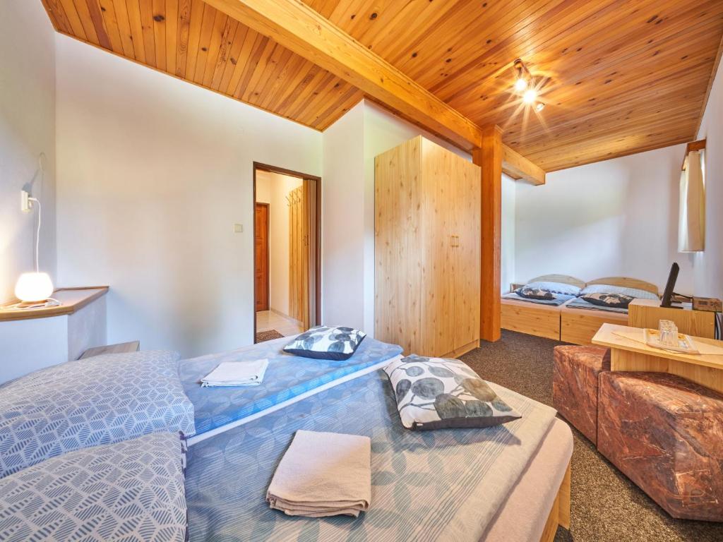 Postel nebo postele na pokoji v ubytování Holiday Home Hodkovice by Interhome