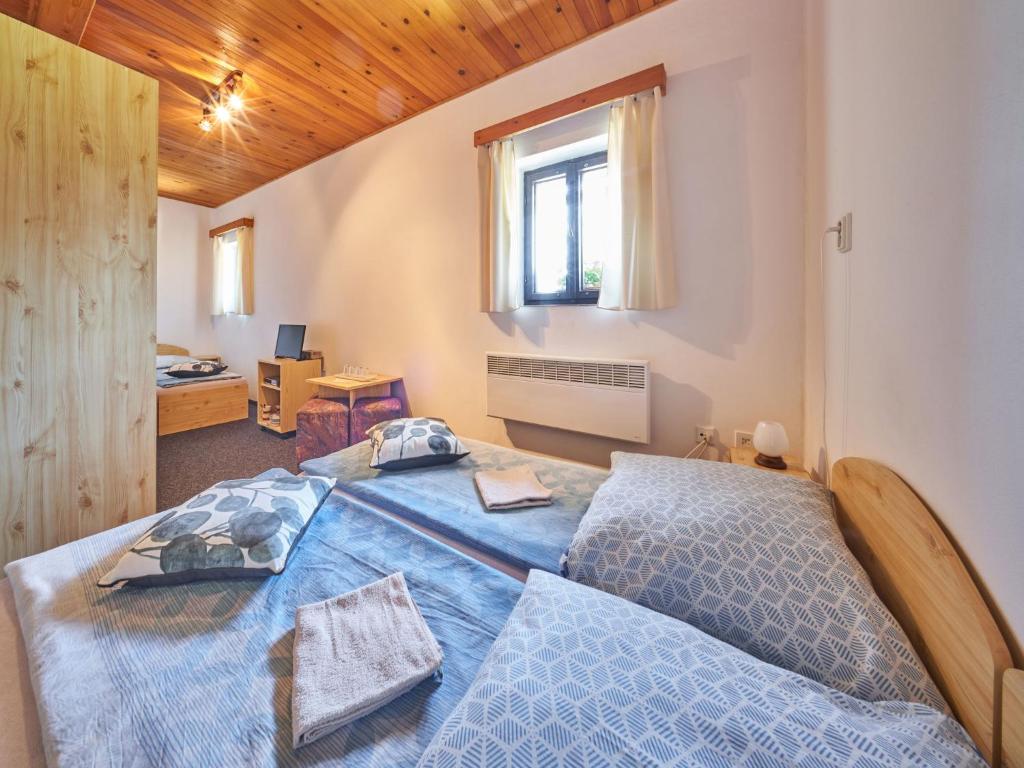 Postel nebo postele na pokoji v ubytování Holiday Home Hodkovice by Interhome