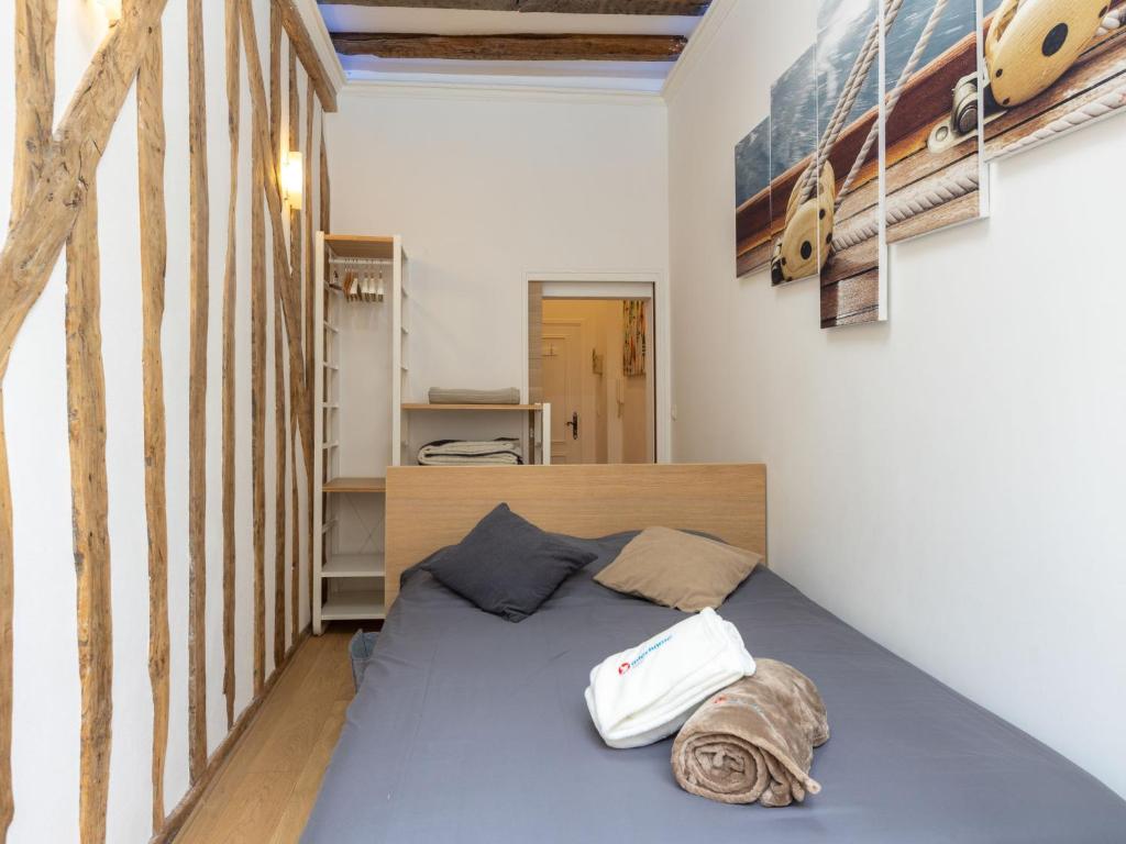 Posteľ alebo postele v izbe v ubytovaní Apartment Le Clemenceau by Interhome
