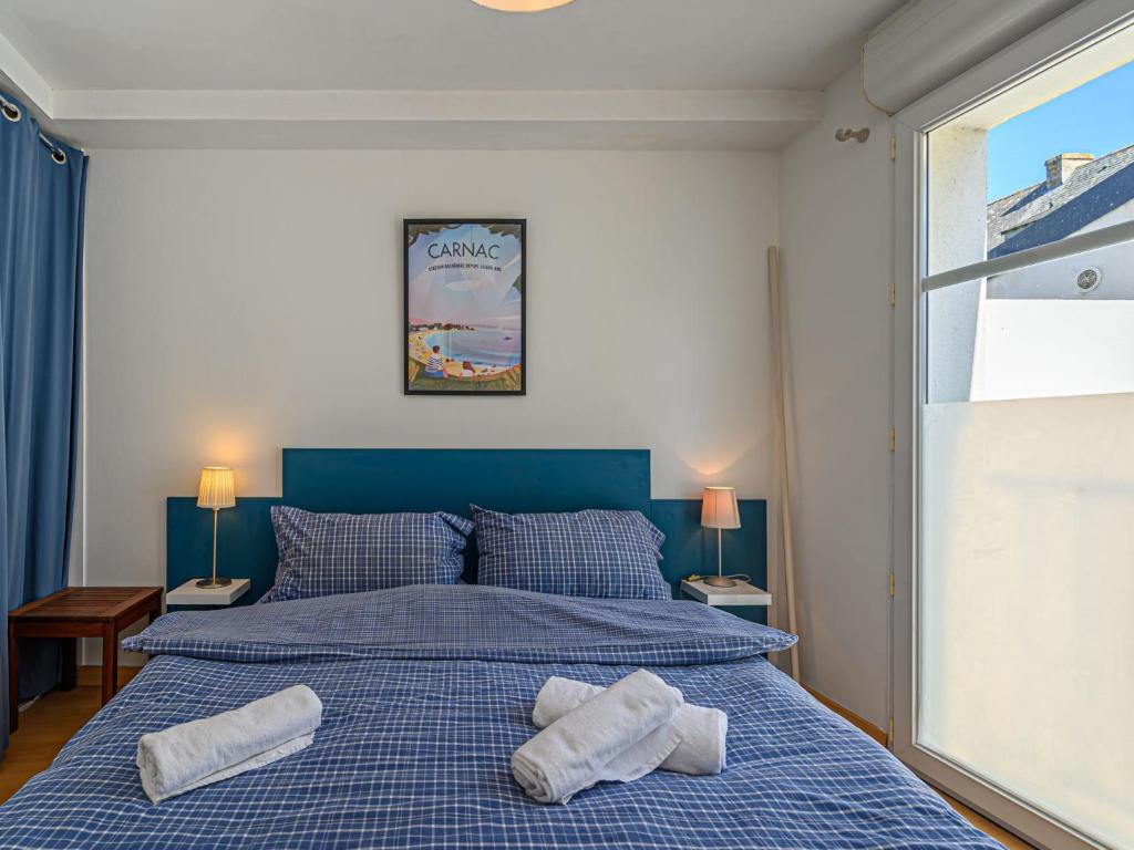 Posteľ alebo postele v izbe v ubytovaní Apartment Kermarine by Interhome