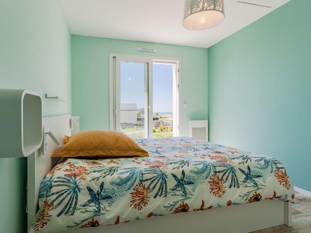 Posteľ alebo postele v izbe v ubytovaní Holiday Home Paradis des Dunes by Interhome