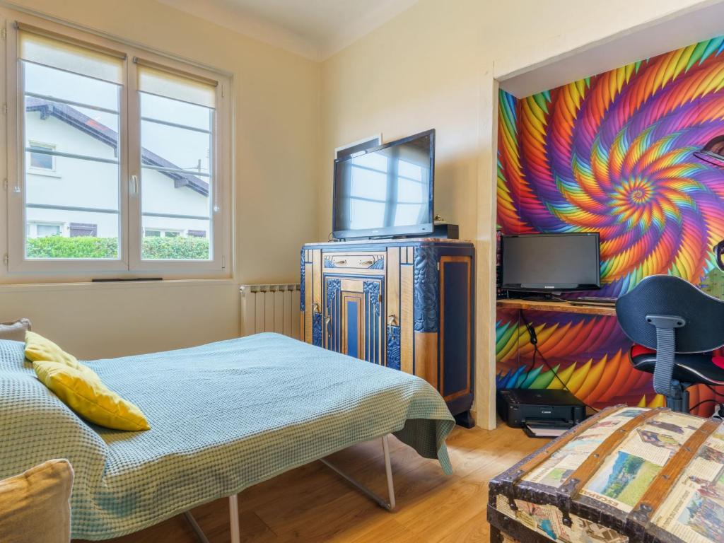 Televízia a/alebo spoločenská miestnosť v ubytovaní Holiday Home Milady II by Interhome