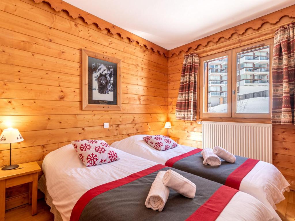 Posteľ alebo postele v izbe v ubytovaní Apartment Ecrin des Neiges - Val Claret-3 by Interhome