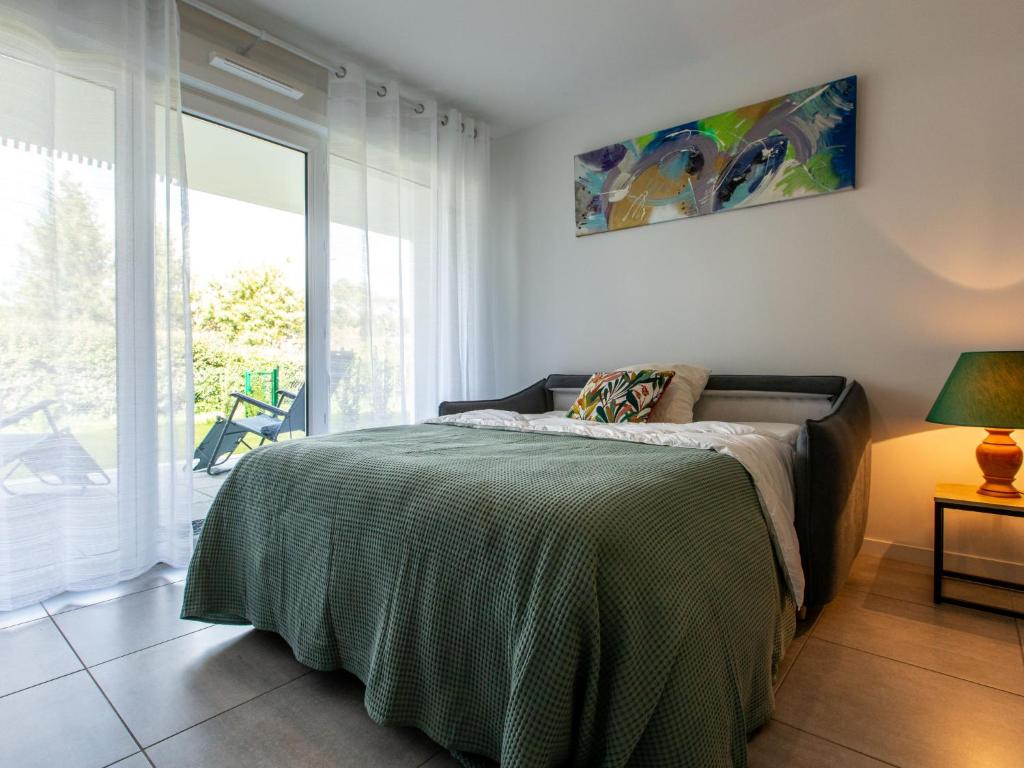Postel nebo postele na pokoji v ubytování Apartment Cap Aréa by Interhome