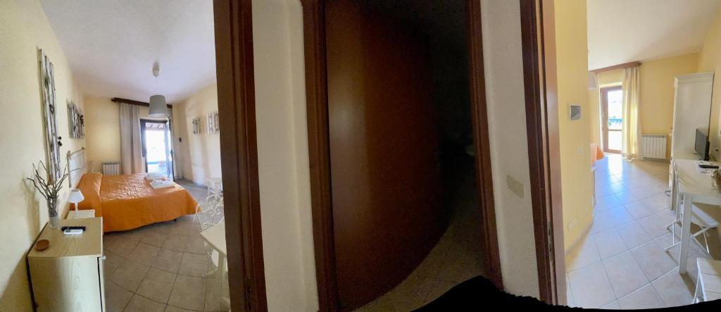 Postel nebo postele na pokoji v ubytování I Puntoni Agriturismo