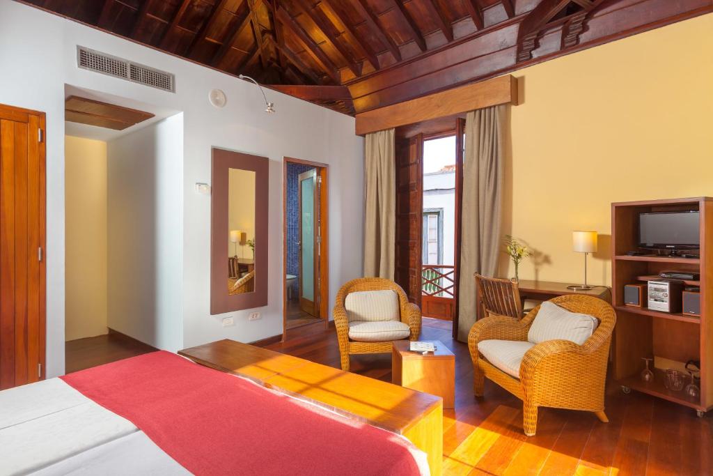 Postel nebo postele na pokoji v ubytování Hotel LIVVO La Quinta Roja