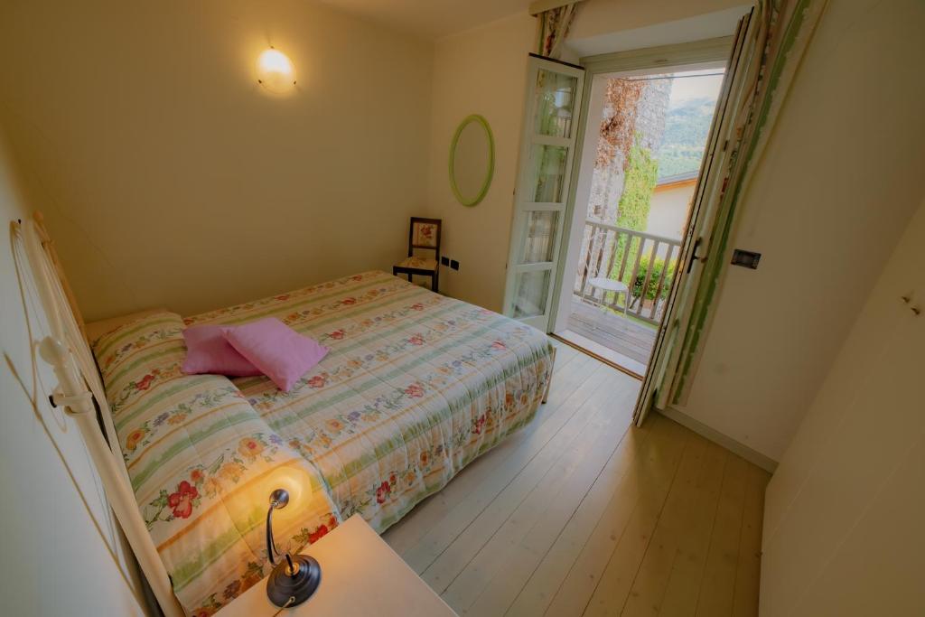 Postel nebo postele na pokoji v ubytování Agriturismo Maso Giomo