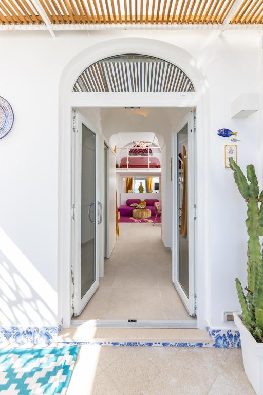 Postel nebo postele na pokoji v ubytování Suite Belvedere Capri Exclusive Rooms