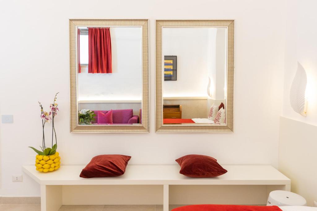 Postel nebo postele na pokoji v ubytování Suite Belvedere Capri Exclusive Rooms